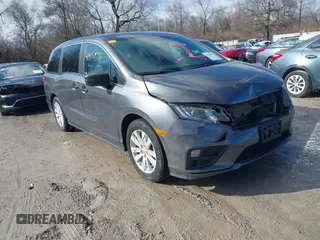 2018 Honda Odyssey LX with VIN 5FNRL6H23JB100572, listed as a IAAI auction lot 41416975 with 79,829 mi miles. Bid and sale history available at carsss.com. Image 1.
