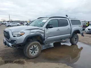 2017 Toyota Tacoma SR5 with VIN 3TMCZ5AN8HM051829, listed as a IAAI auction lot 41616329 with 64,113 mi miles and . Bid and sale history available at DreamBid. Image 6.