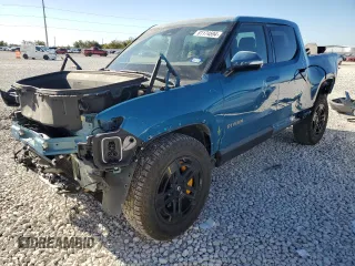 2023 Rivian R1T Adventure with VIN 7FCTGAAA2PN017881, listed as a Copart auction lot 81174594 with 30,903 mi miles and Salvage Title. Bid and sale history available at carsss.com. Image 1.