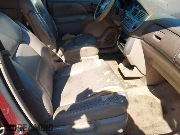 2001 Toyota Sienna LE with VIN 4T3ZF13C61U336492, listed as a IAAI auction lot 41896586 with 191,571 mi miles. Bid and sale history available at carsss.com. Image 5.