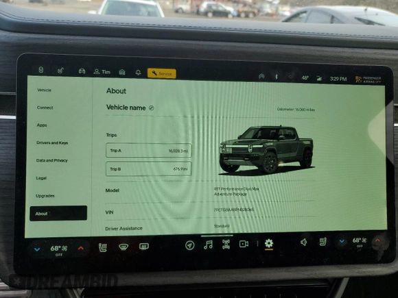 2023 Rivian R1T Adventure z VIN 7FCTGBAA8PN028065, wystawiony jako Copart lot #81941474 z przebiegiem 16 060 mil mil oraz Szkoda całkowita • Salvage title. Historia ofert i sprzedaży dostępna na DreamBid. Obrazek 9.