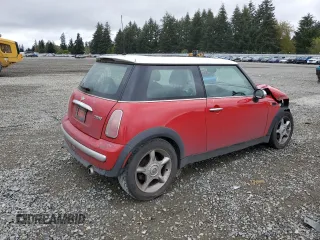 2004 MINI Hardtop with VIN WMWRC33464TJ54261, listed as a Copart auction lot 55150205 with 212,636 mi miles and Salvage Title. Bid and sale history available at DreamBid. Image 3.