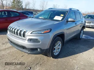 2014 Jeep Cherokee Latitude with VIN 1C4PJMCSXEW125737, listed as a IAAI auction lot 41863778 with 120,226 mi miles. Bid and sale history available at carsss.com. Image 17.