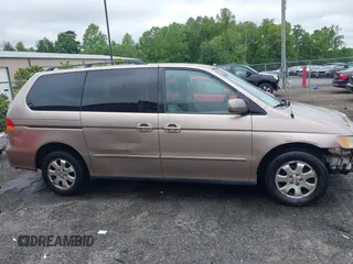 2004 Honda Odyssey EX-L z VIN 5FNRL18024B079462, wystawiony jako IAAI lot #42227175 z przebiegiem 267 661 mil mil oraz . Historia ofert i sprzedaży dostępna na DreamBid. Obrazek 14.