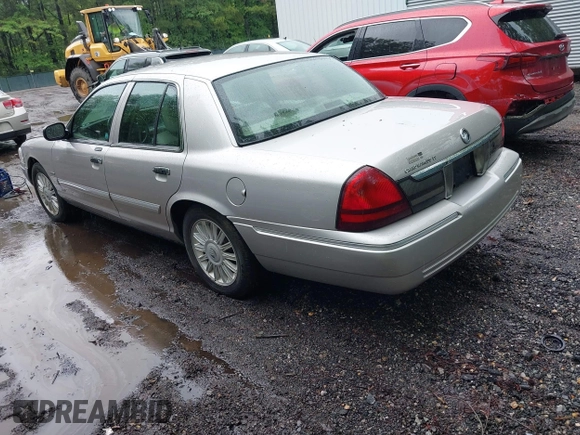 2010 Mercury Grand Marquis LS z VIN 2MEBM7FV5AX606629, wystawiony jako IAAI lot #42345444 z przebiegiem 66 600 mil mil oraz . Historia ofert i sprzedaży dostępna na DreamBid. Obrazek 3.