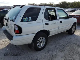 2002 Isuzu Rodeo S z VIN 4S2CK58W424342189, wystawiony jako Copart lot #76187294 z przebiegiem 139 827 mil mil oraz Szkody całkowita. Historia ofert i sprzedaży dostępna na DreamBid. Obrazek 3.