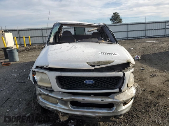 1997 Ford F-150 XL with VIN 1FTDX1869VKA43999, listed as a Copart auction lot 42239815 with 145,238 mi miles and Salvage Title. Bid and sale history available at carsss.com. Image 5.