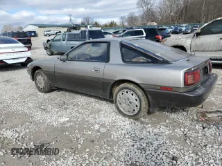 1986 Toyota Supra z VIN JT2MA70L3G0009411, wystawiony jako Copart lot #87545755 z przebiegiem 151 108 mil mil oraz Czysty tytuł • Clean title. Historia ofert i sprzedaży dostępna na DreamBid. Obrazek 2.