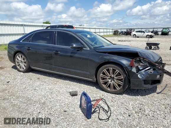 2014 Audi A8 4.0T with VIN WAUR2AFD0EN004347, listed as a Copart auction lot 56222025 with 108,517 mi miles and Salvage title. Bid and sale history available at DreamBid. Image 4.