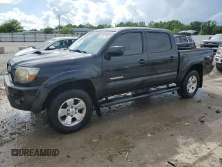2009 Toyota Tacoma z VIN 3TMLU42N09M028506, wystawiony jako Copart lot #56977785 z przebiegiem 233 784 mil mil oraz Nie do naprawy • Non repairable. Historia ofert i sprzedaży dostępna na DreamBid. Obrazek 1.