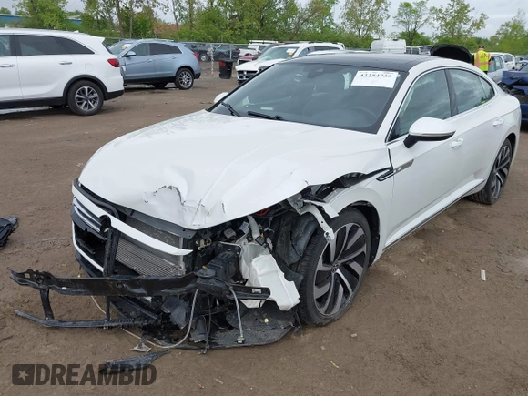2021 Volkswagen Arteon SEL R-Line z VIN WVWSR7AN6ME007156, wystawiony jako IAAI lot #42254735 z przebiegiem 32 004 mil mil oraz . Historia ofert i sprzedaży dostępna na DreamBid. Obrazek 18.