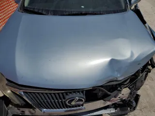 2011 Lexus RX 350 with VIN 2T2ZK1BA9BC056651, listed as a Copart auction lot 57199025 with 104,949 mi miles and Salvage title. Bid and sale history available at DreamBid. Image 12.