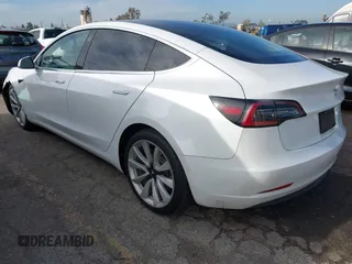 2020 Tesla Model 3 Long Range with VIN 5YJ3E1EB9LF620771, listed as a IAAI auction lot 41795008 with 53,155 mi miles and . Bid and sale history available at DreamBid. Image 3.