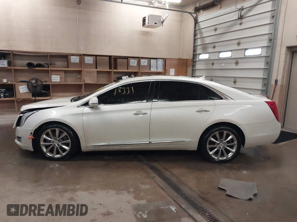 2013 Cadillac XTS Luxury with VIN 2G61R5S37D9152726, listed as a IAAI auction lot 41718331 with 88,189 mi miles and . Bid and sale history available at DreamBid. Image 13.