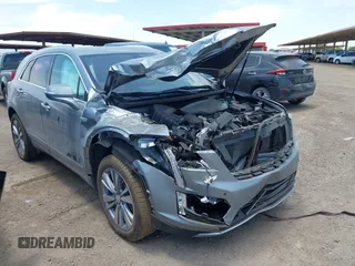 2025 Cadillac XT5 FWD Premium Luxury with VIN 1GYKNCRS9SZ121490, listed as a IAAI auction lot 42648408 with 11,778 mi miles and . Bid and sale history available at DreamBid. Image 1.