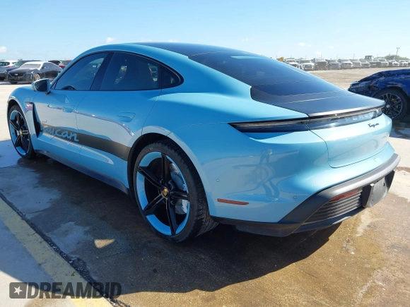 2022 Porsche Taycan with VIN WP0AA2Y10NSA10908, listed as a IAAI auction lot 42257582 with 23,806 mi miles and . Bid and sale history available at DreamBid. Image 3.