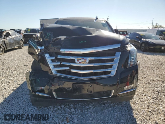 2019 Cadillac Escalade Luxury z VIN 1GYS4BKJXKR389513, wystawiony jako Copart lot #53869495 z przebiegiem 98 892 mil mil oraz Szkoda całkowita • Salvage title. Historia ofert i sprzedaży dostępna na DreamBid. Obrazek 5.