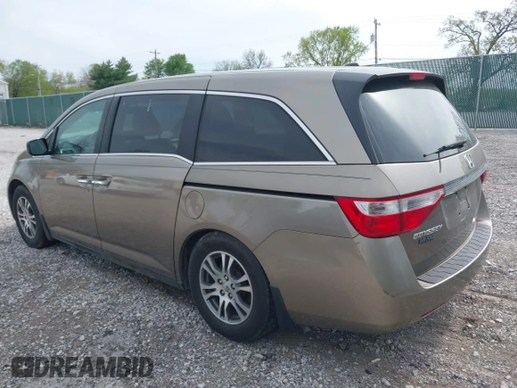 2013 Honda Odyssey EX-L with VIN 5FNRL5H65DB064238, listed as a IAAI auction lot 42050743 with 189,437 mi miles and . Bid and sale history available at carsss.com. Image 3.