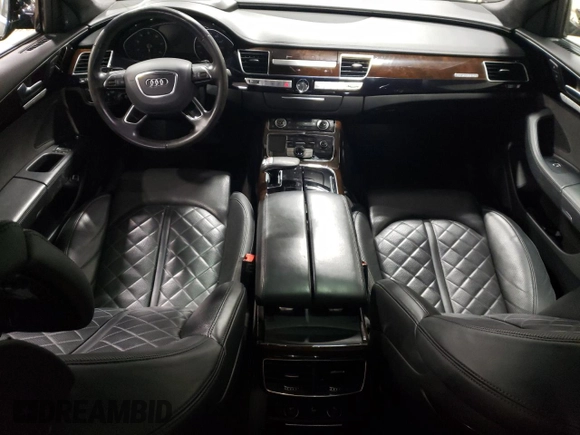 2015 Audi A8 4.0T z VIN WAU32AFD0FN017865, wystawiony jako Copart lot #37065594 z przebiegiem 55 632 mil mil oraz Szkoda całkowita • Salvage title. Historia ofert i sprzedaży dostępna na DreamBid. Obrazek 8.