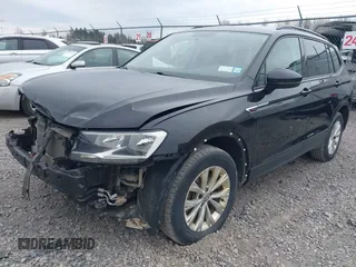 2019 Volkswagen Tiguan S with VIN 3VV0B7AX9KM019775, listed as a IAAI auction lot 41897497 with 61,691 mi miles and . Bid and sale history available at DreamBid. Image 18.