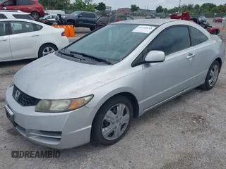 2009 Honda Civic Cpe LX with VIN 2HGFG12609H533389, listed as a IAAI auction lot 42210833 with 233,360 mi miles. Bid and sale history available at carsss.com. Image 2.