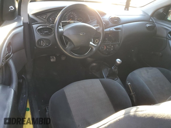 2000 Ford Focus ZX3 with VIN 3FAHP3131YR213601, listed as a Copart auction lot 88597525 with 134,724 mi miles and Salvage title. Bid and sale history available at DreamBid. Image 8.