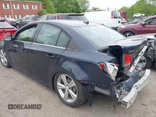 2014 Chevrolet Cruze 1LT z VIN 1G1PC5SBXE7433740, wystawiony jako IAAI lot #42282321 z przebiegiem 148 282 mil mil oraz . Historia ofert i sprzedaży dostępna na DreamBid. Obrazek 3.