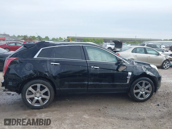 2012 Cadillac SRX Performance Collection с VIN 3GYFNEE32CS596327, выставлен на аукционе IAAI как лот 42343005 с пробегом 149 715 миль миль и . История ставок и продаж доступна на DreamBid. Изображение 13.