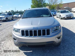 2016 Jeep Grand Cherokee Laredo z VIN 1C4RJFAG0GC384227, wystawiony jako IAAI lot #41995947 z przebiegiem 155 276 mil mil oraz . Historia ofert i sprzedaży dostępna na DreamBid. Obrazek 6.