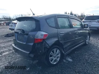 2011 Honda Fit Sport z VIN JHMGE8H54BC000162, wystawiony jako IAAI lot #41665321 z przebiegiem 154 531 mil mil oraz . Historia ofert i sprzedaży dostępna na DreamBid. Obrazek 6.