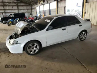 1999 Mazda Protege DX with VIN JM1BJ2224X0108695, listed as a Copart auction lot 85617034 with 112,898 mi miles and Salvage Title. Bid and sale history available at DreamBid. Image 1.