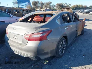 2018 Nissan Altima SV with VIN 1N4AL3AP2JC244604, listed as a IAAI auction lot 41023897 with Not Provided miles and . Bid and sale history available at DreamBid. Image 4.