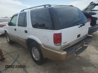 2000 GMC Jimmy SL with VIN 1GKCS13W4Y2106047, listed as a Copart auction lot 75257184 with 73,571 mi miles and Non Repairable. Bid and sale history available at carsss.com. Image 2.