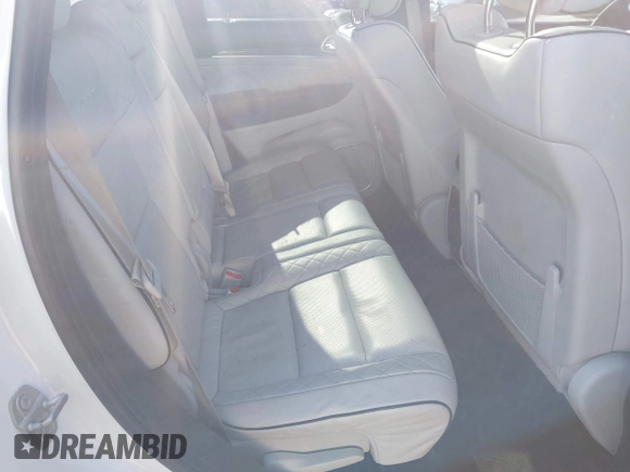 2018 Jeep Grand Cherokee Summit with VIN 1C4RJFJT4JC212819, listed as a IAAI auction lot 41975614 with 88,112 mi miles and . Bid and sale history available at DreamBid. Image 8.