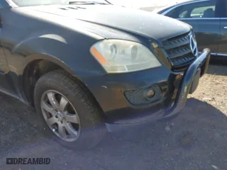 2006 Mercedes-Benz M-Class 3.5L with VIN 4JGBB86E06A121940, listed as a IAAI auction lot 42069185 with 127,660 mi miles. Bid and sale history available at carsss.com. Image 13.