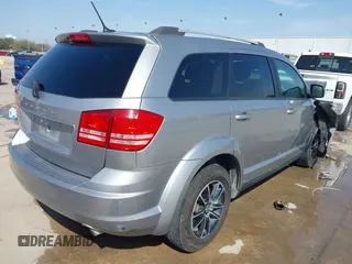 2017 Dodge Journey SE with VIN 3C4PDCABXHT662235, listed as a IAAI auction lot 41767844 with Not Provided miles and . Bid and sale history available at DreamBid. Image 4.