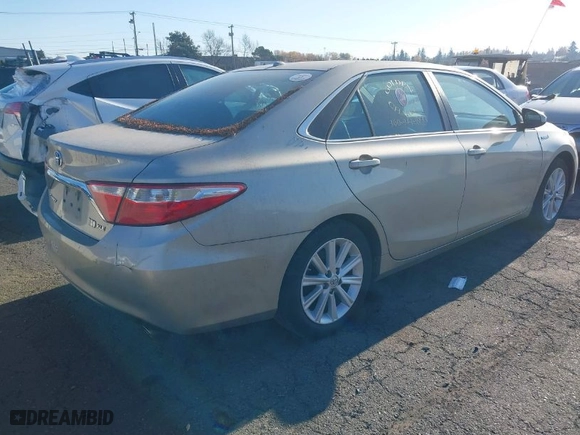 2016 Toyota Camry Hybrid LE with VIN 4T1BD1FKXGU196829, listed as a IAAI auction lot 38160003 with 339,752 mi miles. Bid and sale history available at carsss.com. Image 4.
