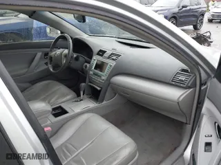 2007 Toyota Camry Hybrid with VIN JTNBB46K673021121, listed as a IAAI auction lot 41988725 with 266,907 mi miles. Bid and sale history available at carsss.com. Image 5.