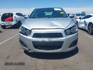 2014 Chevrolet Sonic LS with VIN 1G1JA6SH1E4135729, listed as a IAAI auction lot 42169273 with 74,969 mi miles and . Bid and sale history available at DreamBid. Image 6.