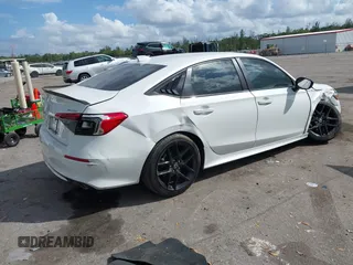 2022 Honda Civic Sedan Sport with VIN 2HGFE2F52NH532042, listed as a IAAI auction lot 41594967 with 76,809 mi miles. Bid and sale history available at carsss.com. Image 4.