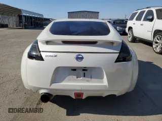 2012 Nissan 370Z с VIN JN1AZ4EH2CM565026, выставлен на аукционе Copart как лот 56129015 с пробегом 113 456 миль миль и Списание • Salvage title. История ставок и продаж доступна на DreamBid. Изображение 10.
