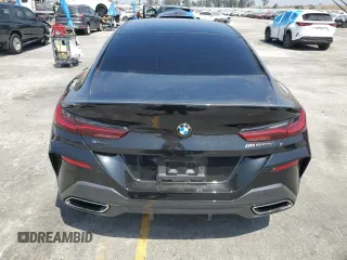 2020 BMW 8 Series M850i with VIN WBAGV8C01LCE50737, listed as a Copart auction lot 58318665 with Not provided miles and Salvage title. Bid and sale history available at DreamBid. Image 6.