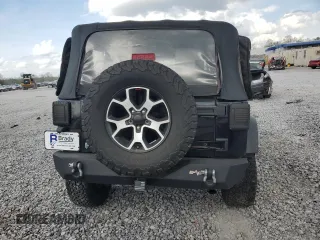 2009 Jeep Wrangler X z VIN 1J4FA24169L706787, wystawiony jako Copart lot #51540265 z przebiegiem 126 934 mil mil oraz Szkoda całkowita • Salvage title. Historia ofert i sprzedaży dostępna na DreamBid. Obrazek 6.