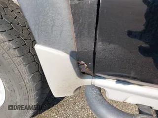 2004 Chevrolet Suburban LT z VIN 3GNFK16T64G278549, wystawiony jako IAAI lot #42569901 z przebiegiem 279 382 mil mil oraz . Historia ofert i sprzedaży dostępna na DreamBid. Obrazek 13.
