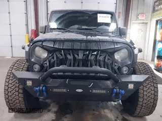 2018 Jeep Wrangler JK Unlimited Sport with VIN 1C4BJWDG0JL867687, listed as a IAAI auction lot 41426838 with 78,116 mi miles. Bid and sale history available at carsss.com. Image 12.