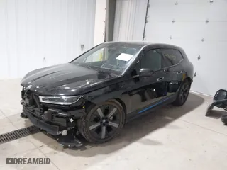 2023 BMW iX xDrive50 with VIN WB523CF04PCL15607, listed as a IAAI auction lot 41315457 with 44,058 mi miles. Bid and sale history available at carsss.com. Image 21.