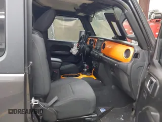2020 Jeep Wrangler Sport S with VIN 1C4GJXAN4LW229040, listed as a IAAI auction lot 42172180 with 58,701 mi miles and . Bid and sale history available at DreamBid. Image 5.