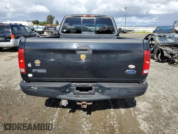 2001 Ford F-150 XL with VIN 1FTRX17W91NB71630, listed as a Copart auction lot 56583545 with 209,009 mi miles and Salvage title. Bid and sale history available at DreamBid. Image 6.
