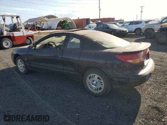 1999 Saturn SC z VIN 1G8ZR1274XZ262181, wystawiony jako Copart lot #75931774 z przebiegiem Nie podano mil oraz Szkoda całkowita • Salvage title. Historia ofert i sprzedaży dostępna na DreamBid. Obrazek 2.