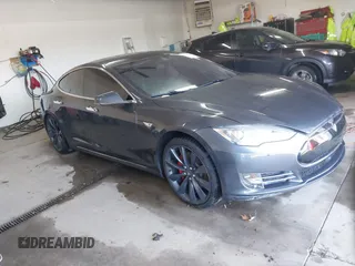 2014 Tesla Model S P85D with VIN 5YJSA1H22EFP64345, listed as a IAAI auction lot 41062130 with 78,832 mi miles and . Bid and sale history available at DreamBid. Image 1.